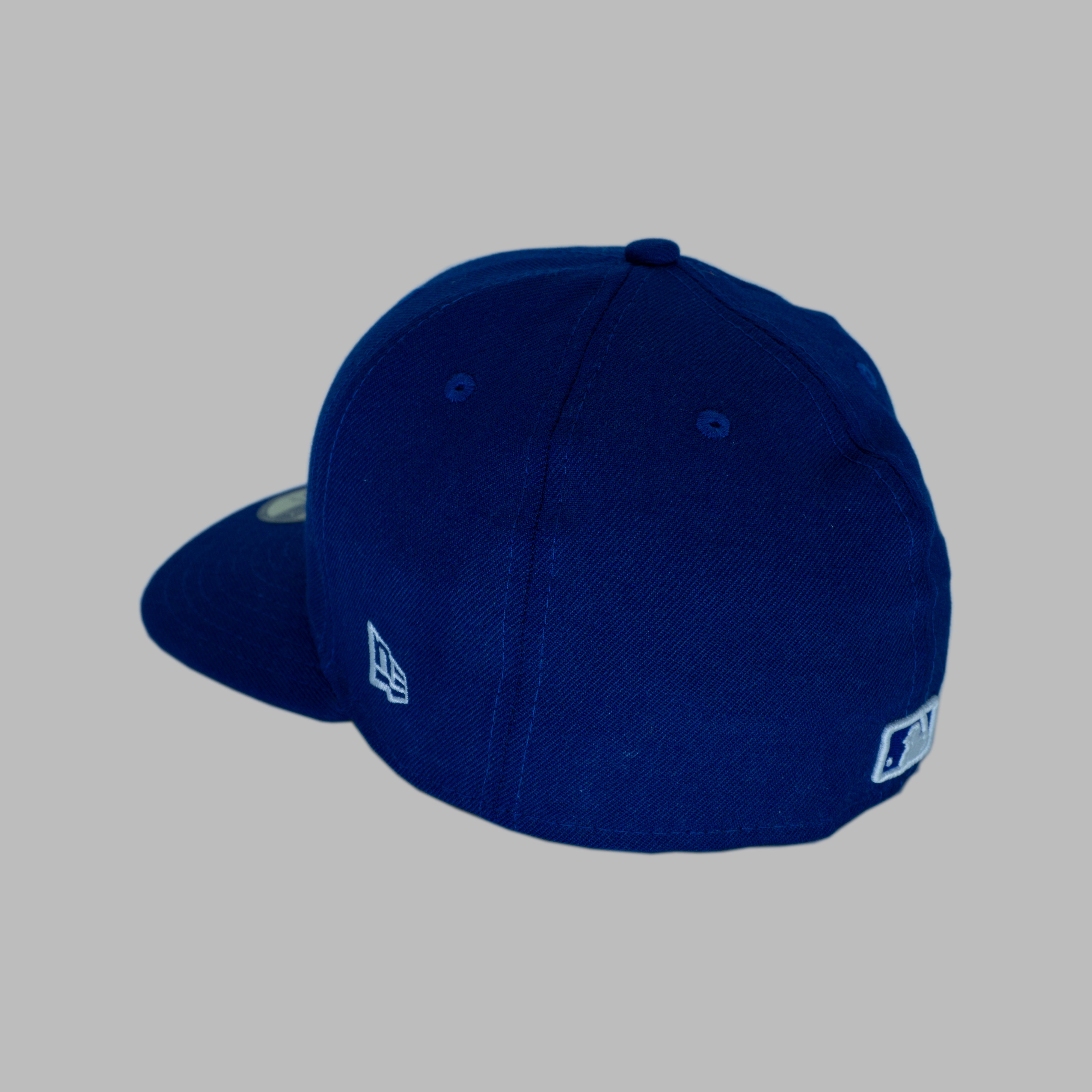 BLUE 2FACED FITTED (size 7 3/8)